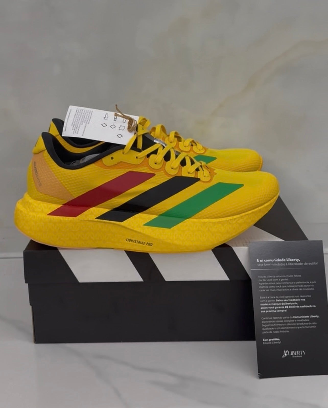 Adidas Adizero EVO SL x Bob Marley Jamaica 26 “Bold Gold”
