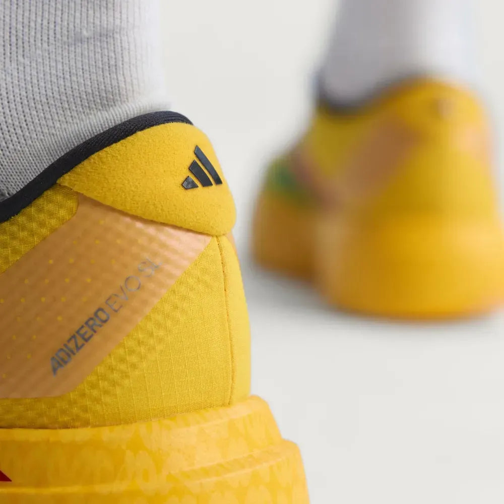 Adidas Adizero EVO SL x Bob Marley Jamaica 26 “Bold Gold”